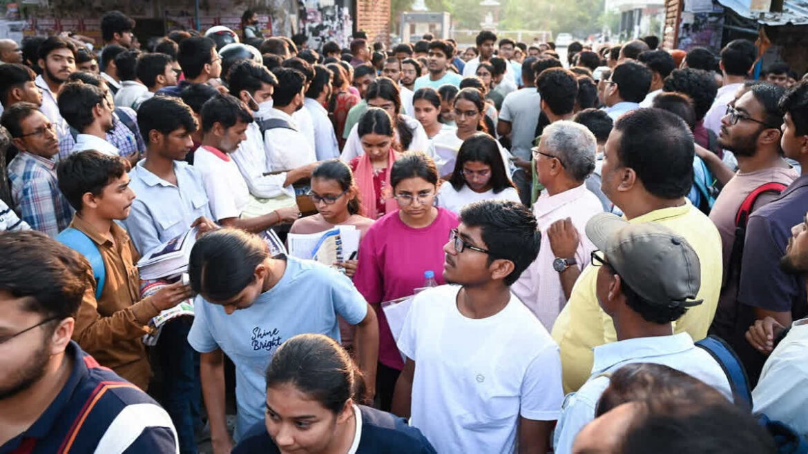 Students gather outside a NEET examination centre in Mumbai before appearing for the Re-NEET 2026 examination.